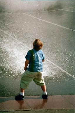 Boy in fountain