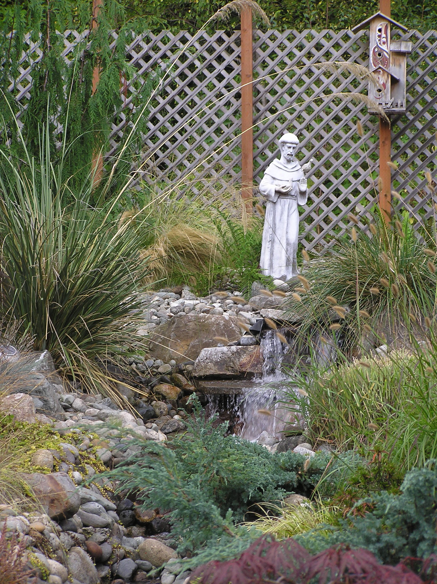 St Francis & waterfall create sacred space