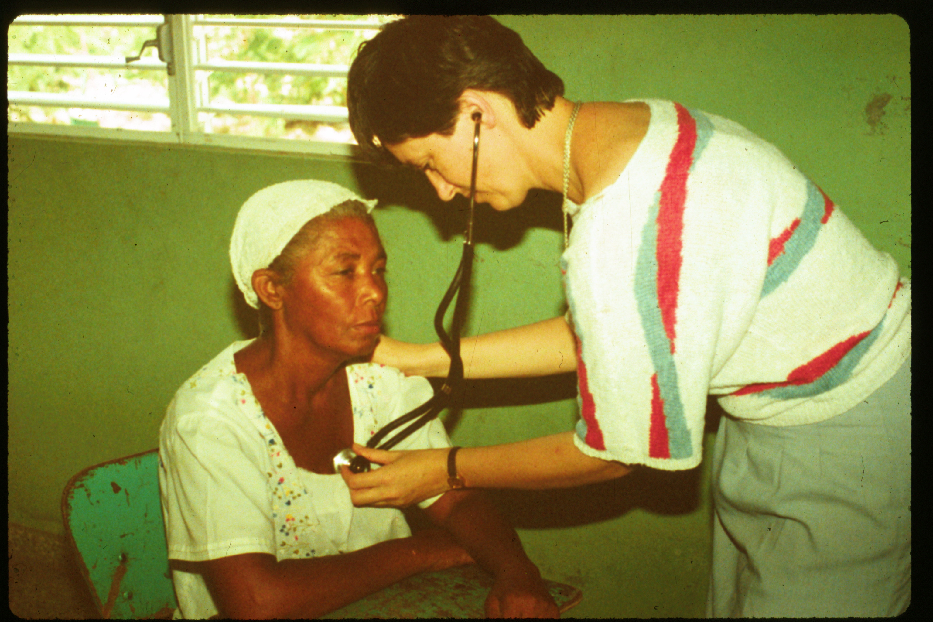 Examining patient medical outreach Dominican republic