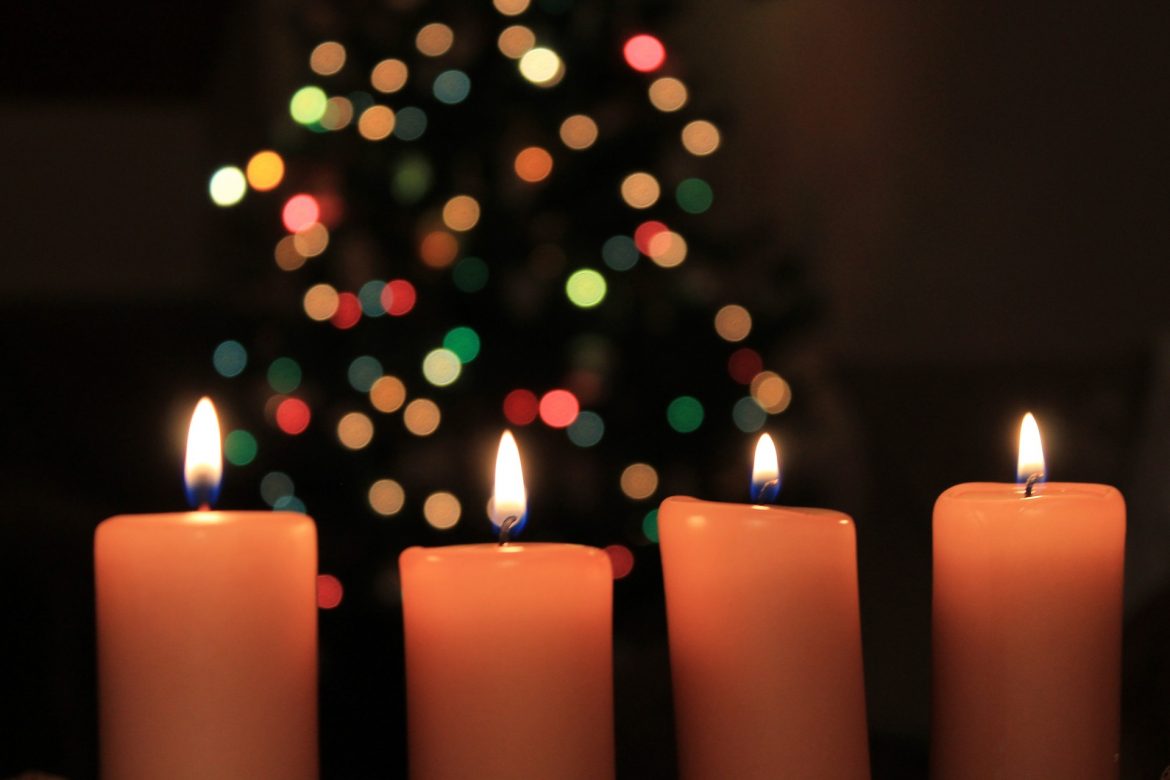 Four lit candles