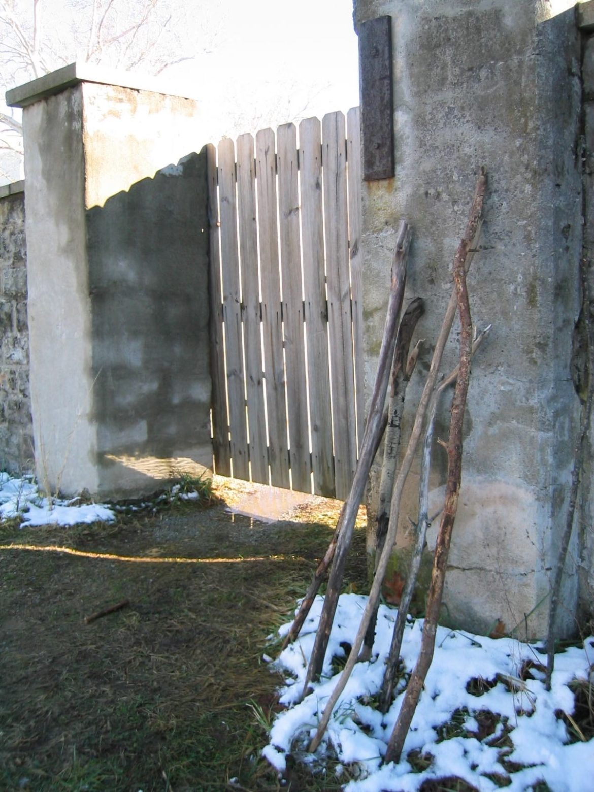 Gate with pilgrim sticks